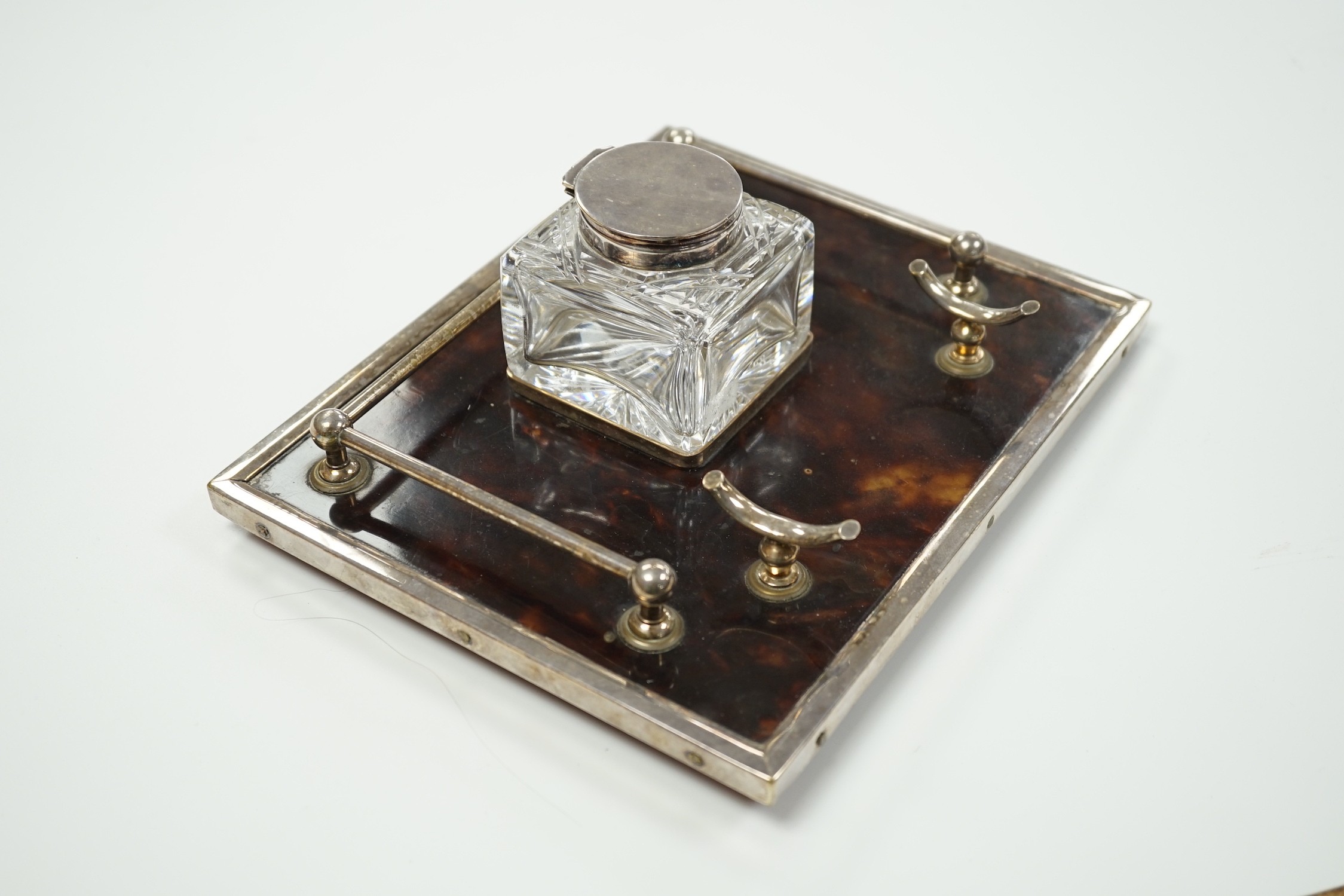 A silver plate mounted tortoiseshell inkstand, 21.5cm wide